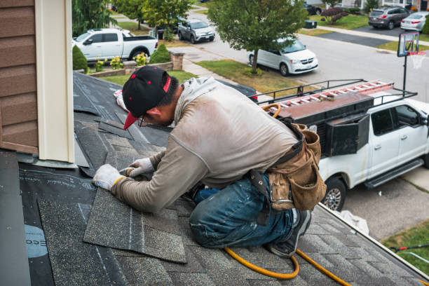 Professional Roof Replacement technician working in Wellington, TX